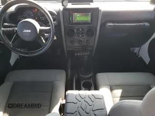 2008 Jeep Wrangler Unlimited X with VIN 1J4GB39128L576571, listed as a Copart auction lot 52706105 with 197,655 mi miles and Clean Title. Bid and sale history available at DreamBid. Image 8.