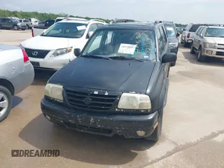 2002 Suzuki XL7 Standard z VIN JS3TX92V924127719, wystawiony jako IAAI lot #42575009 z przebiegiem 298 096 mil mil oraz . Historia ofert i sprzedaży dostępna na DreamBid. Obrazek 6.