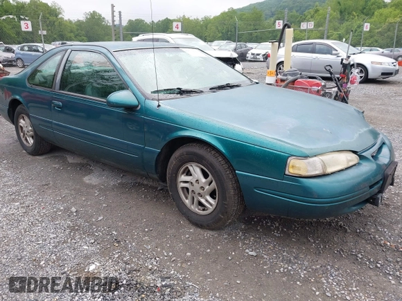 1996 Ford Thunderbird LX z VIN 1FALP62W9TH118637, wystawiony jako IAAI lot #42311641 z przebiegiem 96 361 mil mil oraz . Historia ofert i sprzedaży dostępna na DreamBid. Obrazek 1.