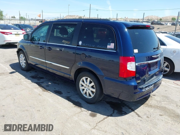 2014 Chrysler Town & Country Touring with VIN 2C4RC1BGXER131707, listed as a IAAI auction lot 42017348 with 120,790 mi miles and . Bid and sale history available at DreamBid. Image 3.