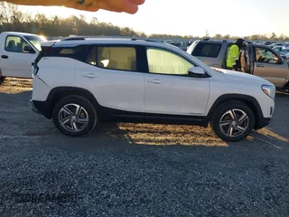 2021 GMC Terrain SLT z VIN 3GKALVEV1ML327811, wystawiony jako IAAI lot #41763301 z przebiegiem 48 774 mil mil oraz . Historia ofert i sprzedaży dostępna na DreamBid. Obrazek 13.