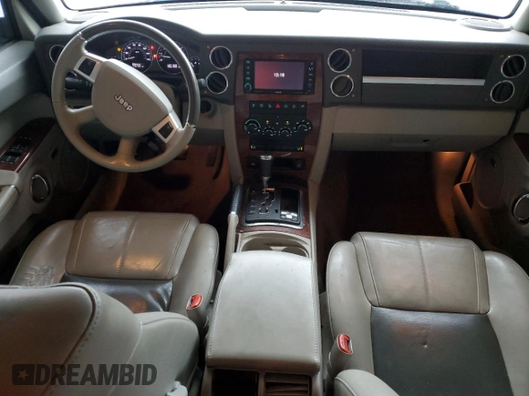 2010 Jeep Commander Limited with VIN 1J4RG5GT0AC137563, listed as a Copart auction lot 54178235 with 146,196 mi miles and Salvage title. Bid and sale history available at DreamBid. Image 8.