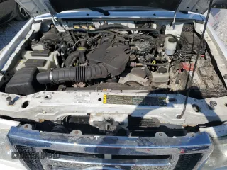2009 Ford Ranger XLT z VIN 1FTZR45E99PA14864, wystawiony jako Copart lot #53185635 z przebiegiem 129 070 mil mil oraz Szkoda całkowita • Salvage title. Historia ofert i sprzedaży dostępna na DreamBid. Obrazek 11.