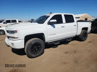 2016 Chevrolet Silverado 1500 LT with VIN 3GCUKREC7GG315533, listed as a Copart auction lot 50883675 with 156,035 mi miles and Salvage Title. Bid and sale history available at DreamBid. Image 1.