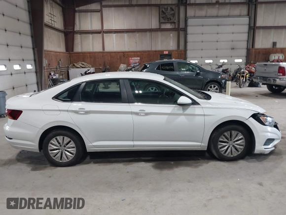 2019 Volkswagen Jetta S z VIN 3VWC57BU6KM129512, wystawiony jako IAAI lot #42205228 z przebiegiem 92 940 mil mil oraz . Historia ofert i sprzedaży dostępna na DreamBid. Obrazek 12.