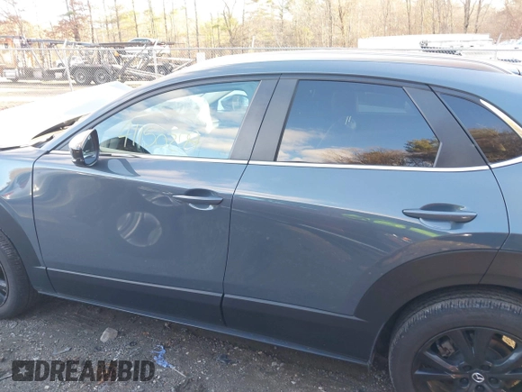 2023 Mazda CX-30 S Carbon Edition with VIN 3MVDMBCM0PM510726, listed as a IAAI auction lot 41150274 with 18,394 mi miles and . Bid and sale history available at DreamBid. Image 14.