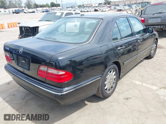 2000 Mercedes-Benz E 320 with VIN WDBJF65J4YB121264, listed as a IAAI auction lot 42245628 with 231,799 mi miles and . Bid and sale history available at DreamBid. Image 4.