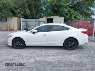 2014 Mazda 6 i Grand Touring with VIN JM1GJ1W67E1139945, listed as a IAAI auction lot 42194243 with 205,545 mi miles. Bid and sale history available at carsss.com. Image 14.