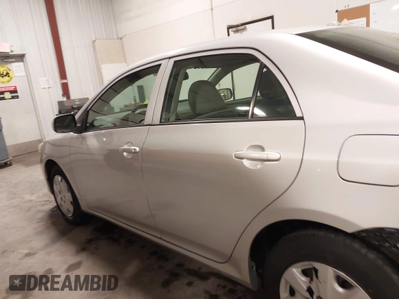 2009 Toyota Corolla with VIN 1NXBU40E69Z129314, listed as a IAAI auction lot 41718098 with 170,739 mi miles. Bid and sale history available at carsss.com. Image 15.