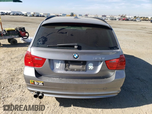 2011 BMW 3 Series 328i with VIN WBAUT9C52BA191581, listed as a Copart auction lot 82901954 with 164,378 mi miles and Clean title. Bid and sale history available at DreamBid. Image 6.