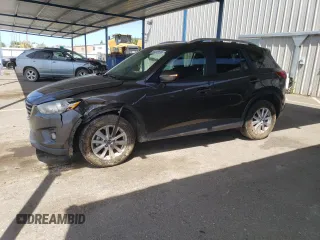 2016 Mazda CX-5 Touring z VIN JM3KE2CY4G0805072, wystawiony jako Copart lot #58435535 z przebiegiem 146 323 mil mil oraz Szkoda całkowita • Salvage title. Historia ofert i sprzedaży dostępna na DreamBid. Obrazek 1.