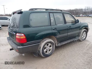 2000 Toyota Land Cruiser with VIN JT3HT05J8Y0084239, listed as a IAAI auction lot 41440548 with 240,000 mi miles. Bid and sale history available at carsss.com. Image 4.