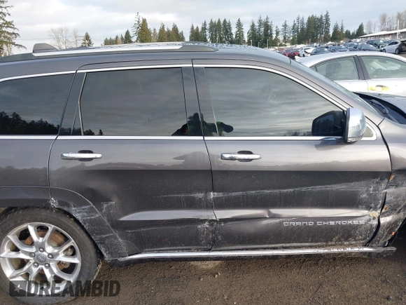 2015 Jeep Grand Cherokee Summit with VIN 1C4RJFJTXFC911170, listed as a IAAI auction lot 41523164 with 74,133 mi miles. Bid and sale history available at carsss.com. Image 13.