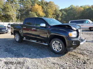2018 GMC Canyon 4WD SLT with VIN 1GTG6DEN4J1296628, listed as a Copart auction lot 77135484 with 74,486 mi miles and Salvage Title. Bid and sale history available at carsss.com. Image 4.