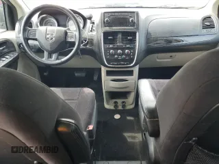 2013 Dodge Grand Caravan SE with VIN 2C4RDGBG2DR791593, listed as a Copart auction lot 51997165 with 84,959 mi miles and Salvage Title. Bid and sale history available at DreamBid. Image 8.