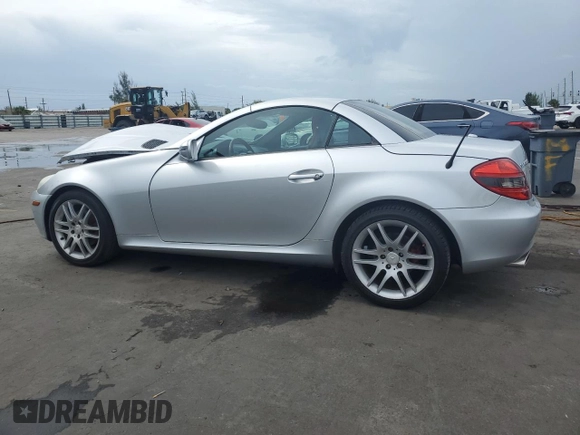 2009 Mercedes-Benz SLK 280 with VIN WDBWK54F89F192082, listed as a Copart auction lot 63422345 with 51,969 mi miles and Salvage title. Bid and sale history available at DreamBid. Image 2.