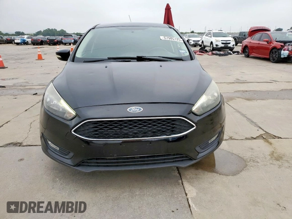 2015 Ford Focus SE z VIN 1FADP3F29FL357021, wystawiony jako Copart lot #57985125 z przebiegiem 142 786 mil mil oraz Szkoda całkowita • Salvage title. Historia ofert i sprzedaży dostępna na DreamBid. Obrazek 5.