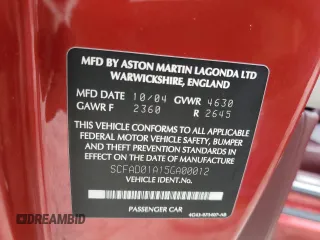 2005 Aston Martin DB9 z VIN SCFAD01A15GA00012, wystawiony jako Copart lot #65919164 z przebiegiem Nie podano mil oraz Szkody całkowita. Historia ofert i sprzedaży dostępna na DreamBid. Obrazek 12.