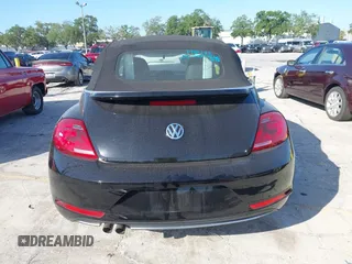 2015 Volkswagen Beetle with VIN 3VW5A7AT7FM811978, listed as a IAAI auction lot 41983986 with 84,421 mi miles and . Bid and sale history available at DreamBid. Image 16.