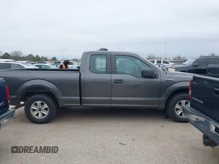 2015 Ford F-150 XL with VIN 1FTEX1CF6FKF02242, listed as a IAAI auction lot 41478528 with 144,197 mi miles. Bid and sale history available at carsss.com. Image 13.