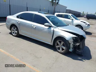 2013 Volkswagen Passat SE with VIN 1VWBP7A39DC026166, listed as a IAAI auction lot 42490233 with 151,084 mi miles and . Bid and sale history available at DreamBid. Image 1.