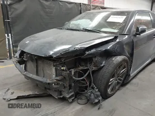2013 Scion tC z VIN JTKJF5C79D3053026, wystawiony jako IAAI lot #42002429 z przebiegiem 95 774 mil mil oraz . Historia ofert i sprzedaży dostępna na DreamBid. Obrazek 6.