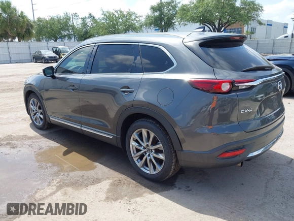 2016 Mazda CX-9 Signature with VIN JM3TCBEY9G0100579, listed as a IAAI auction lot 42282293 with 142,700 mi miles and . Bid and sale history available at DreamBid. Image 3.