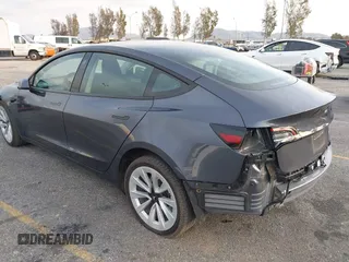 2023 Tesla Model 3 Long Range with VIN 5YJ3E1EB7PF681784, listed as a IAAI auction lot 41534837 with 20,882 mi miles and . Bid and sale history available at DreamBid. Image 3.