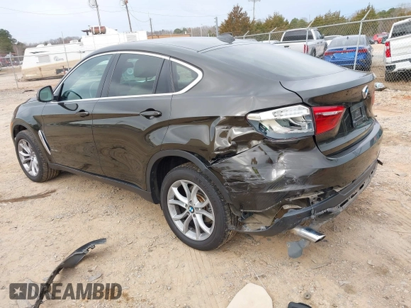 2015 BMW X6 xDrive35i z VIN 5UXKU2C56F0N76862, wystawiony jako IAAI lot #41747776 z przebiegiem 119 426 mil mil oraz . Historia ofert i sprzedaży dostępna na DreamBid. Obrazek 3.
