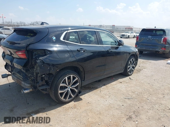 2018 BMW X2 xDrive28i with VIN WBXYJ5C33JEF80454, listed as a IAAI auction lot 41876188 with 34,596 mi miles. Bid and sale history available at carsss.com. Image 4.