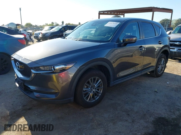 2017 Mazda CX-5 Touring with VIN JM3KFBCL2H0165625, listed as a IAAI auction lot 41879145 with 64,745 mi miles. Bid and sale history available at carsss.com. Image 17.