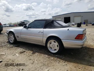1999 Mercedes-Benz SL-Class with VIN WDBFA68F3XF182706, listed as a Copart auction lot 48736405 with 116,560 mi miles and Salvage Title. Bid and sale history available at carsss.com. Image 2.