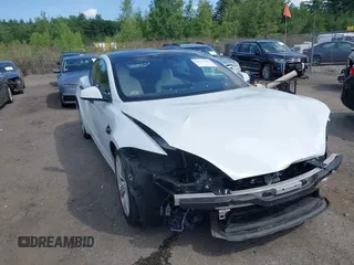 2021 Tesla Model S Long Range z VIN 5YJSA1E57MF428512, wystawiony jako IAAI lot #42511020 z przebiegiem 29 611 mil mil oraz . Historia ofert i sprzedaży dostępna na DreamBid. Obrazek 1.