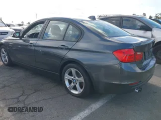 2012 BMW 3 Series 328i with VIN WBA3A5G54CNP17918, listed as a IAAI auction lot 41736136 with 96,913 mi miles and . Bid and sale history available at carsss.com. Image 3.