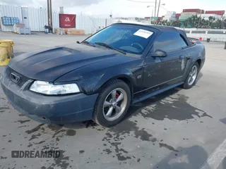 2000 Ford Mustang GT with VIN 1FAFP45X1YF165489, listed as a IAAI auction lot 41926293 with 144,312 mi miles. Bid and sale history available at carsss.com. Image 17.