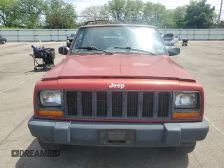 1998 Jeep Cherokee Sport with VIN 1J4FJ68S2WL285432, listed as a Copart auction lot 57183145 with 284,162 mi miles and Clean title. Bid and sale history available at DreamBid. Image 5.