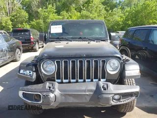 2023 Jeep Wrangler Sahara with VIN 1C4HJXEN5PW702268, listed as a IAAI auction lot 42288704 with 57,240 mi miles and . Bid and sale history available at DreamBid. Image 12.