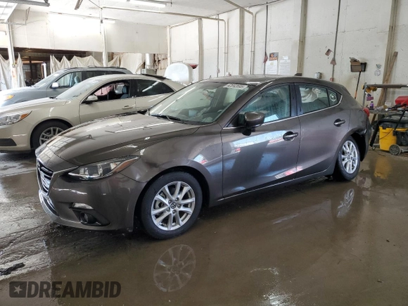 2015 Mazda 3 i Grand Touring with VIN JM1BM1M75F1231814, listed as a Copart auction lot 62692695 with 49,253 mi miles and Salvage title. Bid and sale history available at DreamBid. Image 1.