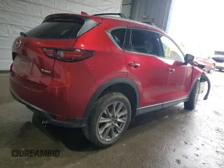 2021 Mazda CX-5 Grand Touring with VIN JM3KFBDM8M0434857, listed as a Copart auction lot 47286545 with Not Provided miles and Salvage Title. Bid and sale history available at DreamBid. Image 3.