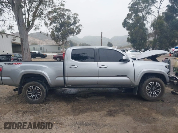 2023 Toyota Tacoma SR5 z VIN 3TMDZ5BN2PM164497, wystawiony jako IAAI lot #42034519 z przebiegiem 25 451 mil mil oraz . Historia ofert i sprzedaży dostępna na DreamBid. Obrazek 13.
