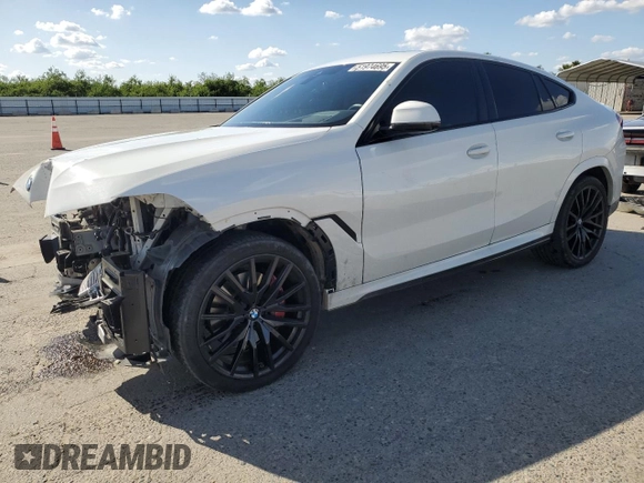 2023 BMW X6 xDrive40i z VIN 5UXCY6C04P9P49005, wystawiony jako Copart lot #51974695 z przebiegiem 30 421 mil mil oraz Szkoda całkowita • Salvage title. Historia ofert i sprzedaży dostępna na DreamBid. Obrazek 1.