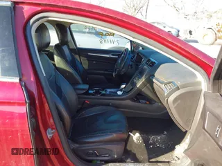2014 Ford Fusion Titanium with VIN 3FA6P0K99ER241148, listed as a IAAI auction lot 41410796 with 217,003 mi miles. Bid and sale history available at carsss.com. Image 5.