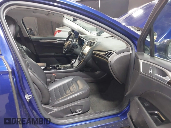 2016 Ford Fusion SE Hybrid with VIN 3FA6P0LU0GR242288, listed as a IAAI auction lot 41867085 with 114,063 mi miles. Bid and sale history available at carsss.com. Image 5.