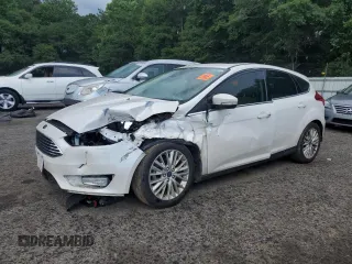 2017 Ford Focus Titanium with VIN 1FADP3N28HL348721, listed as a Copart auction lot 61567795 with Not provided miles and Salvage title. Bid and sale history available at DreamBid. Image 1.