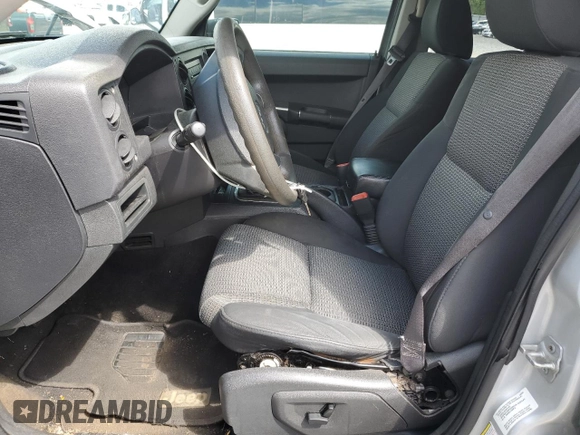 2009 Jeep Commander Sport with VIN 1J8HH48K89C540189, listed as a Copart auction lot 52552235 with 258,377 mi miles and Salvage title. Bid and sale history available at DreamBid. Image 7.