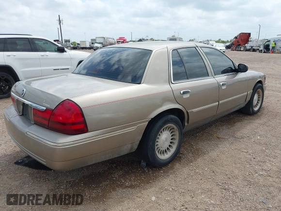2004 Mercury Grand Marquis GS with VIN 2MEFM74W94X671873, listed as a IAAI auction lot 42130841 with 92,757 mi miles and . Bid and sale history available at DreamBid. Image 4.