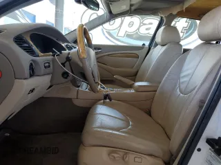 2000 Jaguar S-Type V8 z VIN SAJDA01D7YGL39410, wystawiony jako Copart lot #56814185 z przebiegiem 47 861 mil mil oraz Szkody całkowita. Historia ofert i sprzedaży dostępna na DreamBid. Obrazek 7.