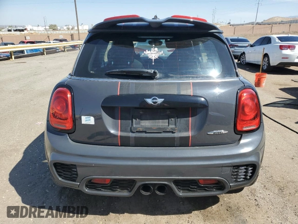 2016 MINI Hardtop John Cooper Works with VIN WMWXM9C50GT997764, listed as a Copart auction lot 52826365 with 82,430 mi miles and Salvage title. Bid and sale history available at DreamBid. Image 6.
