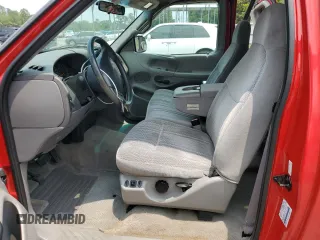1997 Ford F-150 XL with VIN 1FTEX17L1VNB55769, listed as a Copart auction lot 58901715 with 174,234 mi miles and Salvage title. Bid and sale history available at DreamBid. Image 7.