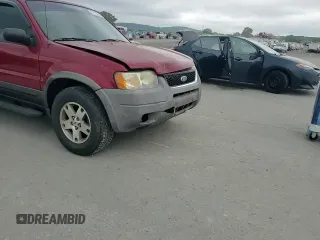 2004 Ford Escape XLT z VIN 1FMYU03104KB51972, wystawiony jako Copart lot #62119665 z przebiegiem 121 785 mil mil oraz Szkoda całkowita • Salvage title. Historia ofert i sprzedaży dostępna na DreamBid. Obrazek 13.